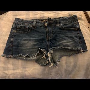 Express ripped Jean shorts. Size 8.